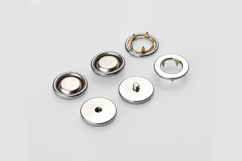 Why Nickel-Free & Eco-Compliance Matter for High-End Metal Buttons？