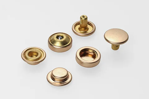 Why Nickel-Free & Eco-Compliance Matter for High-End Metal Buttons？